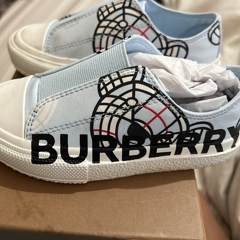 Pale blue low top sneakers